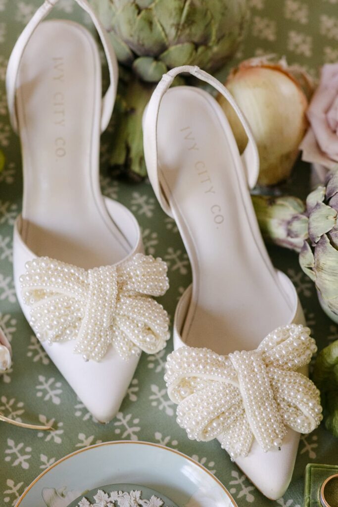 pearl bow on bridal shoes 